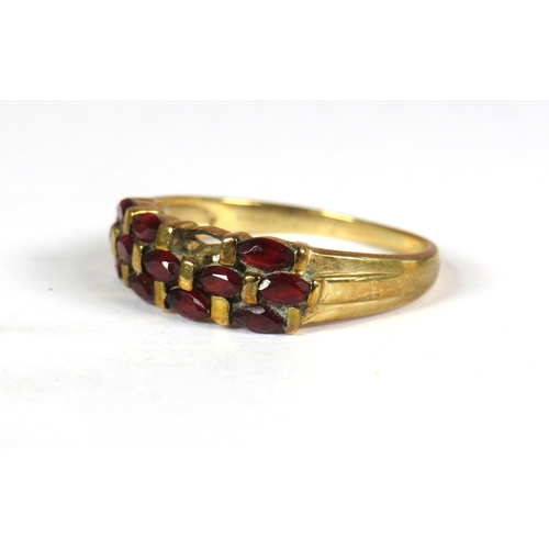 339 - 9ct Yellow Gold Garnet Set ring. Finger size 'R' 2.7g (One Stone Missing)