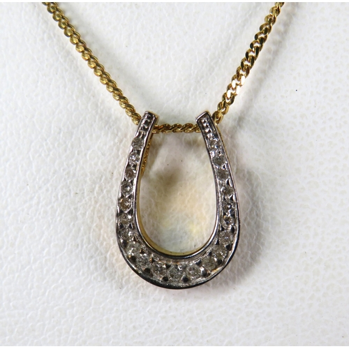 353 - 9ct Yellow Gold Horseshoe Pendant which is encrusted with Melee Diamonds. Set on an 18 inch 9ct Yell... 