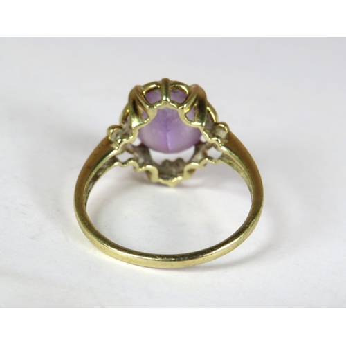 358 - 9ct Yellow Gold ring set with a large Oval Amethyst which measures approx 12 x 10 mm. Finger size 'T... 