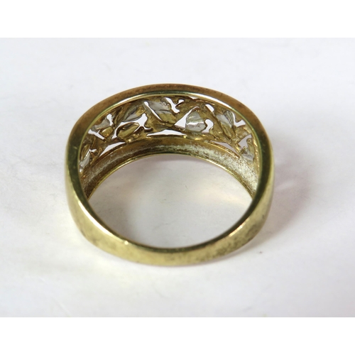 362 - 9ct Yellow Gold Roman Style Pierced ring with white gold highlights. Finger size 'U'.  4.0g