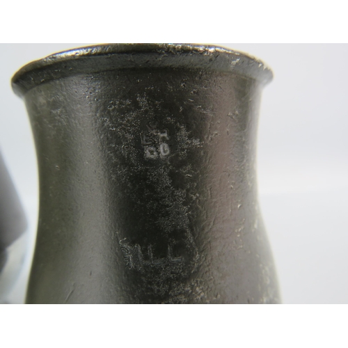 409 - Two Tulip shaped 19th century English pewter tankards a pint and a gill.