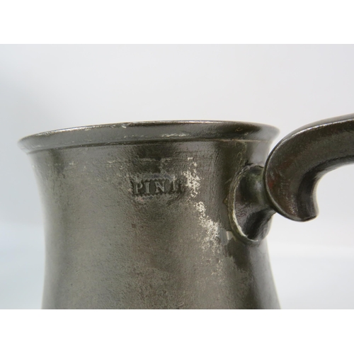 409 - Two Tulip shaped 19th century English pewter tankards a pint and a gill.