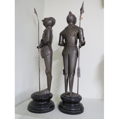 424 - Two metal knight statues on wooden bases 18