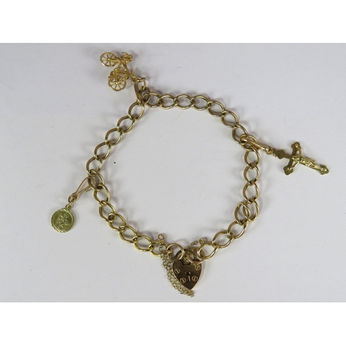 378 - 9ct Yellow Gold Charm Bracelet on a large link chain. Charms include St Christopher, Bicycle, Crucif... 