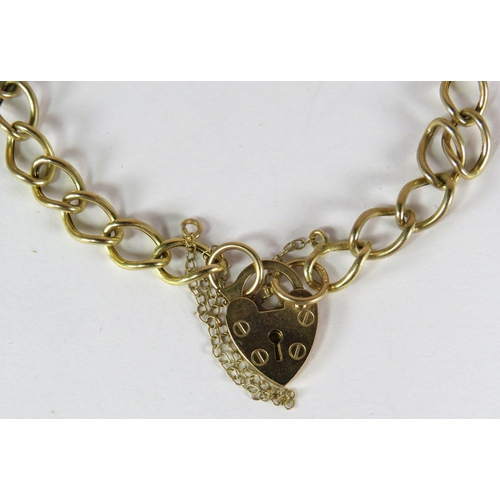 378 - 9ct Yellow Gold Charm Bracelet on a large link chain. Charms include St Christopher, Bicycle, Crucif... 