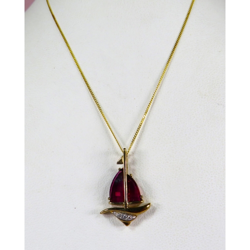 381 - 9ct Yellow Gold Pendant as a Ship with Ruby Sails and Diamond set Hull. Set on a 17 inch 9ct Chain. ... 