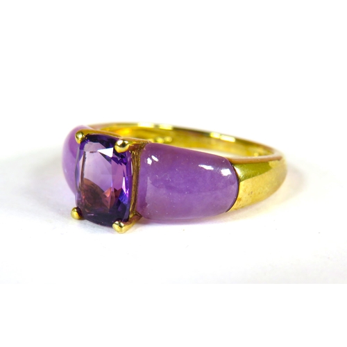 383 - 9ct Yellow Gold Ring set with a Central Amethyst with Cloudy curved Amethyst Shoulders. Finger size ... 