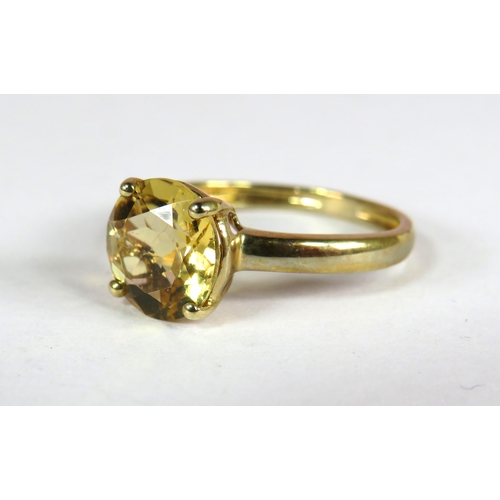 385 - 9ct Yellow Gold Ring set with a Large Circular Citrine.. Finger size 'N'   1.9g