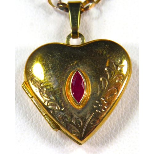 395 - 9ct Yellow Gold Locket set with a Boat Shaped Ruby, Fancy Scrolling to front. Set on a 17 inch Belch... 