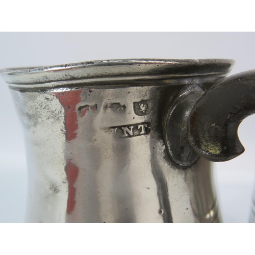 516 - Victorian pewter tulip shaped pint tankard plus a u shaped 1/2 pint tankard.