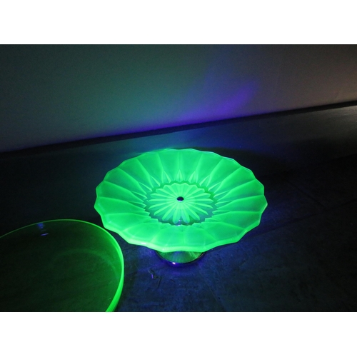 541 - Art deco uranium glass cake stand, centre piece bowl and rimmed plate.