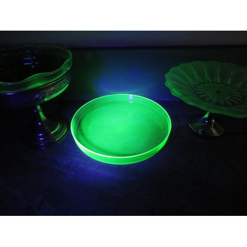 541 - Art deco uranium glass cake stand, centre piece bowl and rimmed plate.