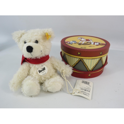 543 - Steiff teddy bear Charly with a trommel box.