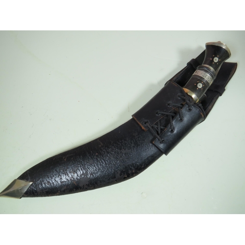 453 - Indian Made Kukri Knife with Leather Scabbard with metal tip complete with matching skinning knives.... 