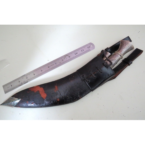 454 - Indian Made Kukri Knife with Leather Scabbard with metal tip complete with matching skinning knives.... 