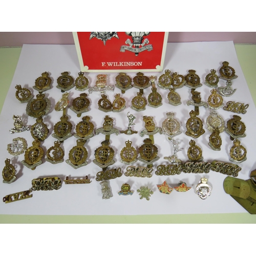 455 - Selection of Military Cap Badges, Mostly RAMC and Royal Signals. Together with a reference book. Bad... 