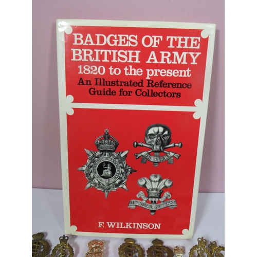 455 - Selection of Military Cap Badges, Mostly RAMC and Royal Signals. Together with a reference book. Bad... 