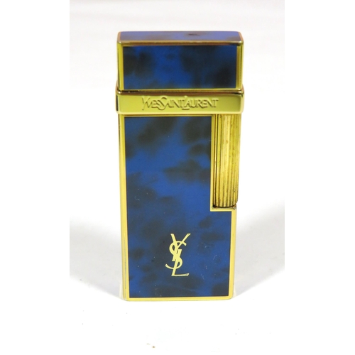 482 - Yves St Lauren Cigarette Lighter with Leather pouch.