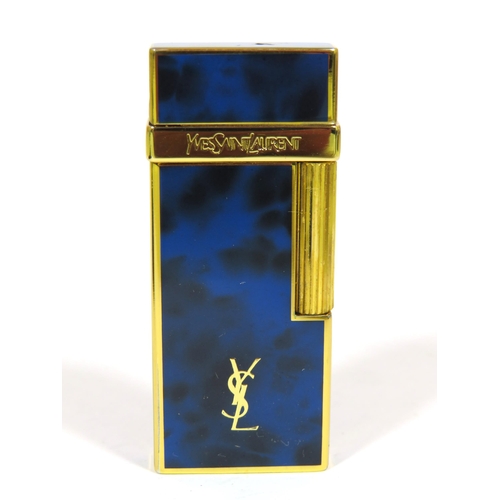 482 - Yves St Lauren Cigarette Lighter with Leather pouch.