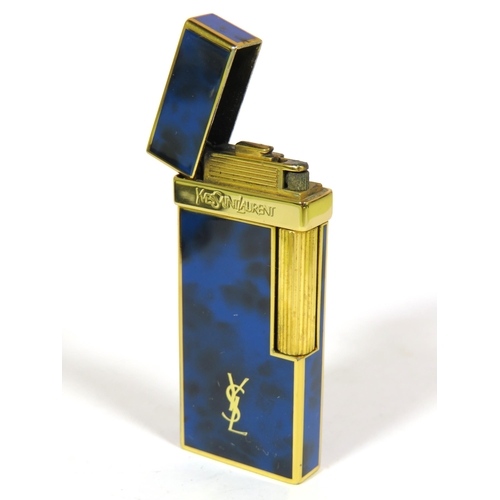 482 - Yves St Lauren Cigarette Lighter with Leather pouch.