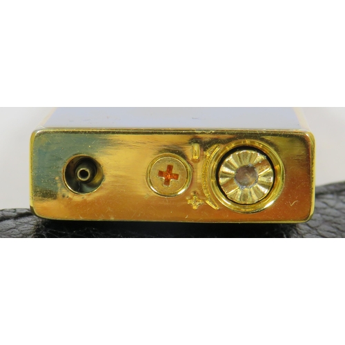 482 - Yves St Lauren Cigarette Lighter with Leather pouch.