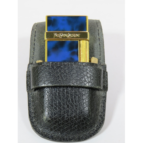 482 - Yves St Lauren Cigarette Lighter with Leather pouch.