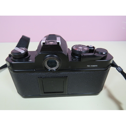 483 - Pentax K1000 with 50mm Lens plus leather carry case plus a Nikon SLR Camera with 50mm Lens. Also two... 