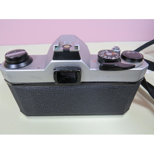 483 - Pentax K1000 with 50mm Lens plus leather carry case plus a Nikon SLR Camera with 50mm Lens. Also two... 