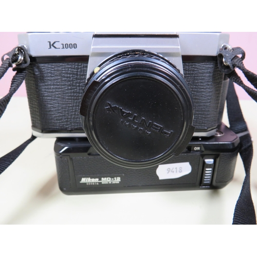 483 - Pentax K1000 with 50mm Lens plus leather carry case plus a Nikon SLR Camera with 50mm Lens. Also two... 