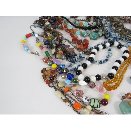 575 - Selection of costume jewellery necklaces, art deco style, Murano glass etc.