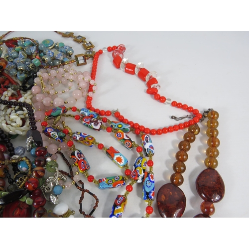 576 - Good selection of costume jewellery necklaces, Murano glass, rose quartz, faux amber etc.