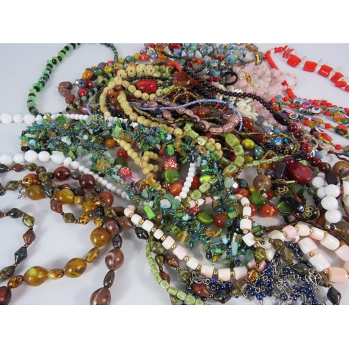 576 - Good selection of costume jewellery necklaces, Murano glass, rose quartz, faux amber etc.