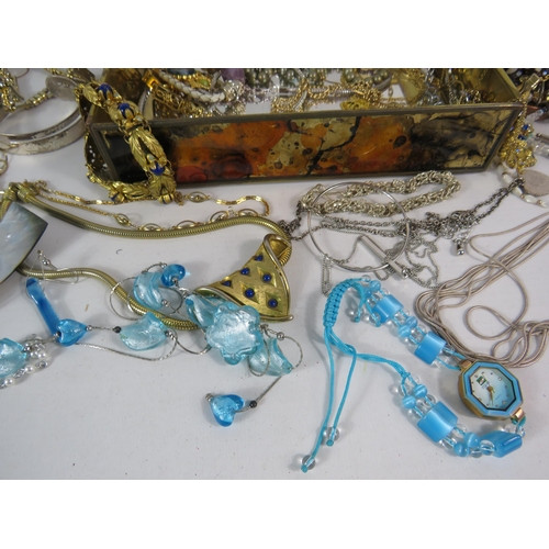 579 - 2 Jewellery with costume jewellery contents and a brass clothes brush.