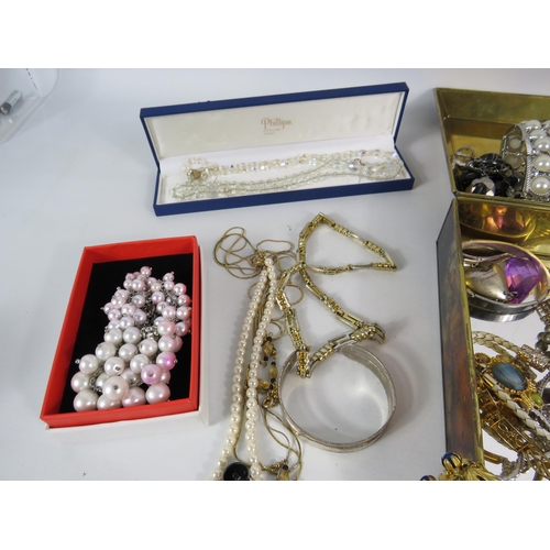 579 - 2 Jewellery with costume jewellery contents and a brass clothes brush.