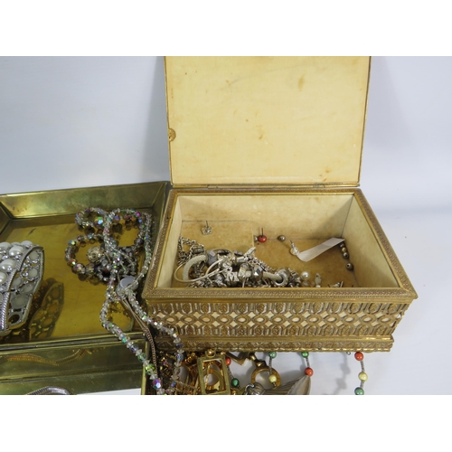 579 - 2 Jewellery with costume jewellery contents and a brass clothes brush.