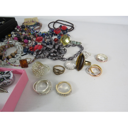 581 - Large Selection of Costume jewellery, necklaces, rings etc.