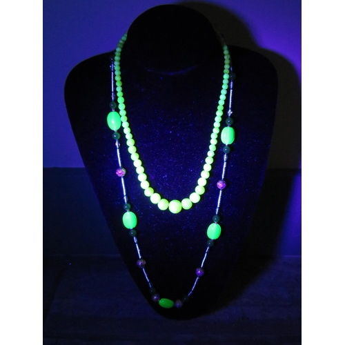 585 - Two Uranium glass necklaces.