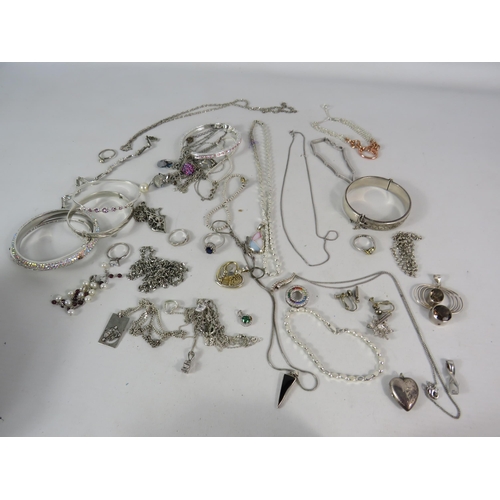 587 - Large selection of 925 silver and silver tone jewellery.