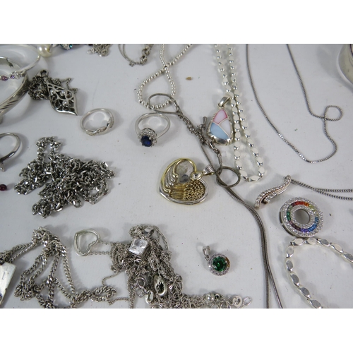 587 - Large selection of 925 silver and silver tone jewellery.