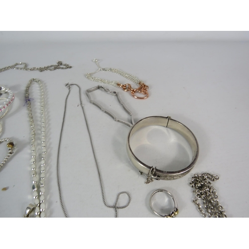 587 - Large selection of 925 silver and silver tone jewellery.