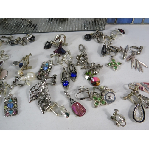 589 - Two jewellery boxes and a selection of clip on earrings including some which are 925 silver.