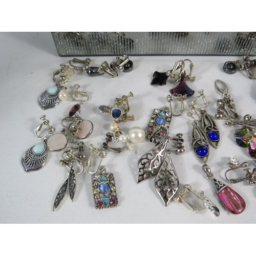 589 - Two jewellery boxes and a selection of clip on earrings including some which are 925 silver.