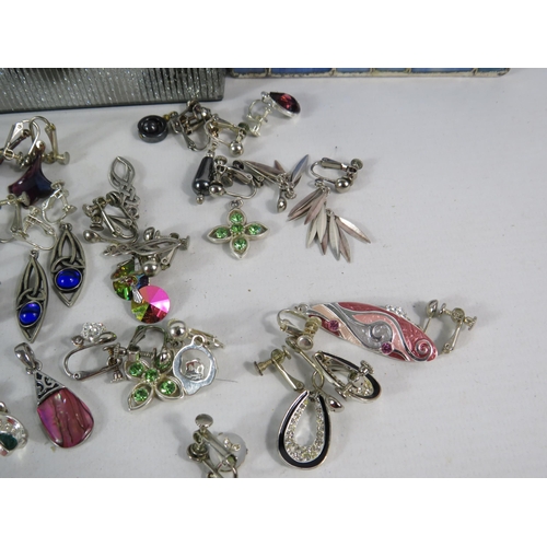 589 - Two jewellery boxes and a selection of clip on earrings including some which are 925 silver.