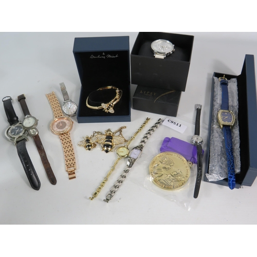 590 - Selection of Ladies quartz wristwatches, a torvill and dean medal etc.