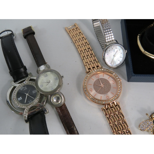 590 - Selection of Ladies quartz wristwatches, a torvill and dean medal etc.