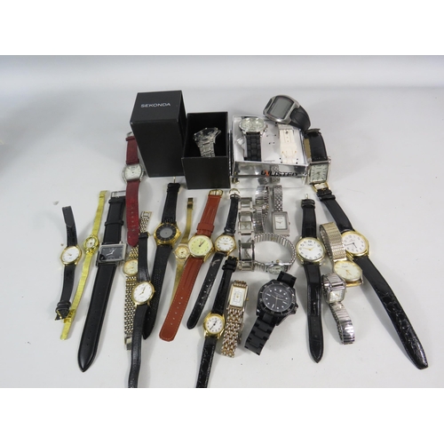 597 - Large selection of mens and ladies quartz wristwatches.