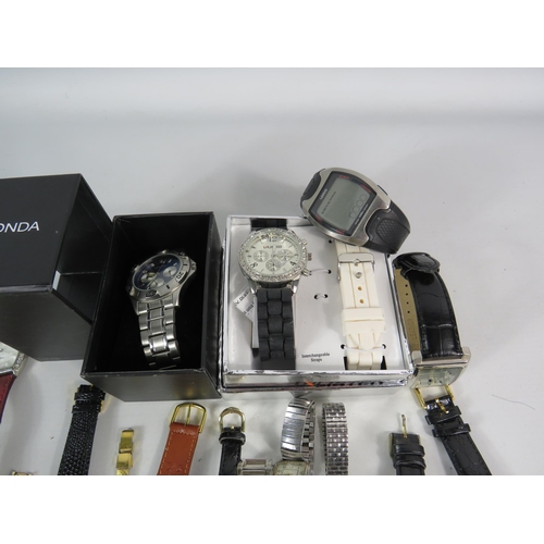 597 - Large selection of mens and ladies quartz wristwatches.