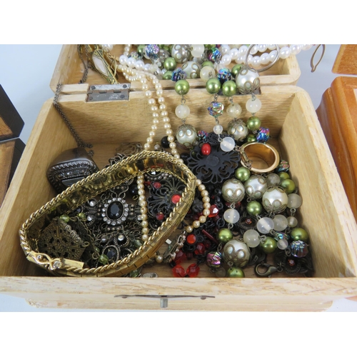 598 - 3 Jewellery boxes and costume jewellery contents.