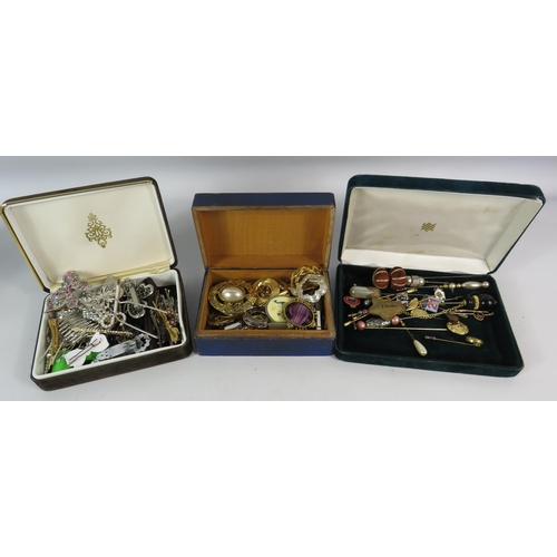 599 - 3 Jewellery boxes and contents, scarf clips, hat pins, stick pins and hair clips.