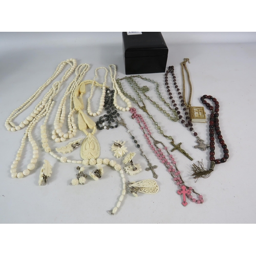 600 - Selection of bone carved jewellery and Rosary necklaces.